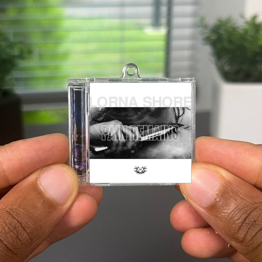 Pain Remains llavero NFC
